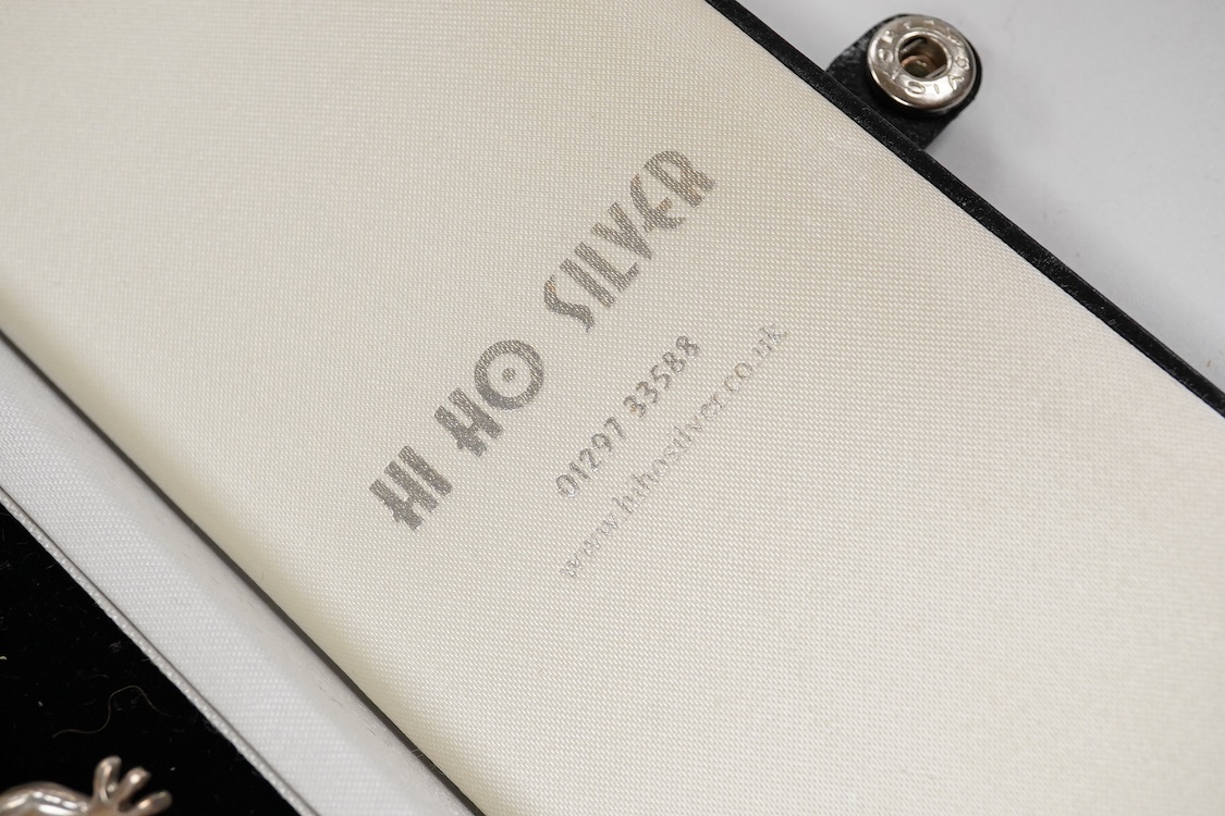 A recent white metal frog necklace, overall length 42cm and matching bracelet, 19cm, both stamped 925, gross 153 grams.